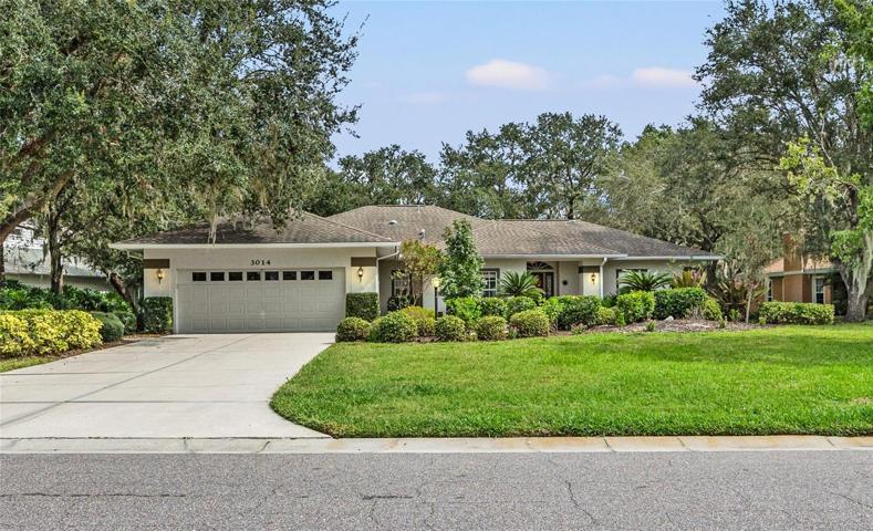 Front Elevation with Manicured Landscaping and Nice Curb Appeal.