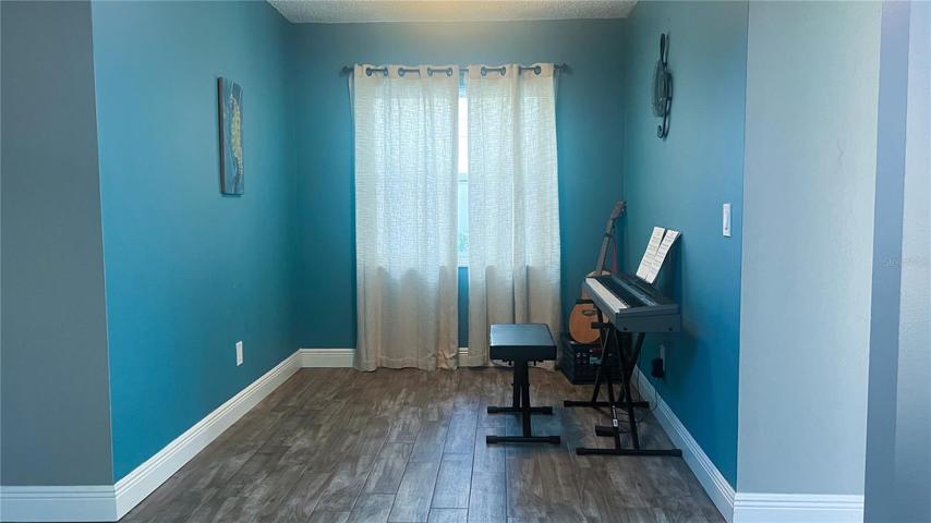 Den adjacent to the living room