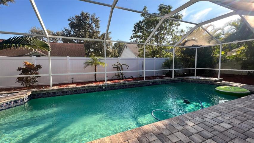 The relaxing pool view from the Florida room