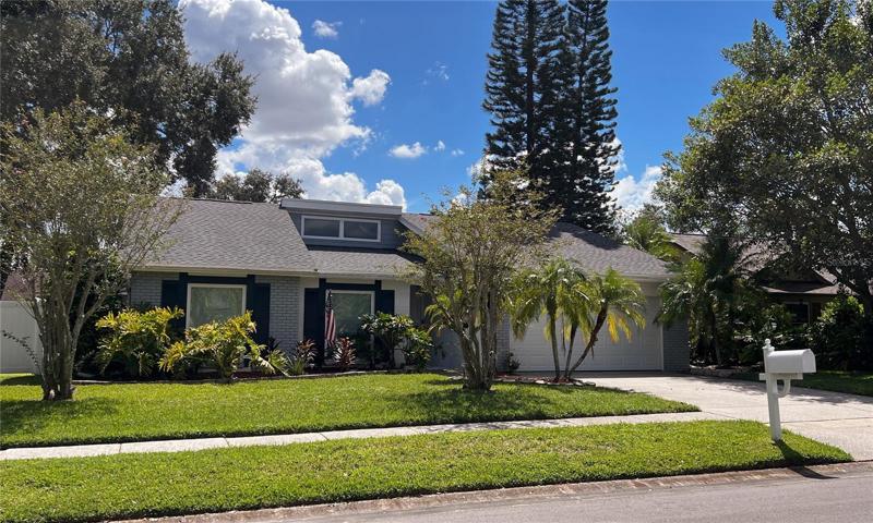 Front of the house with mature landscaping