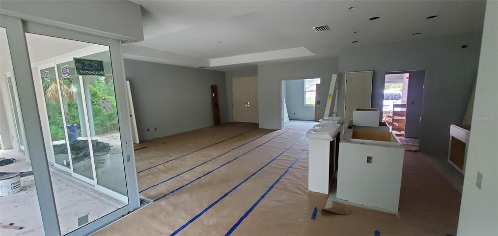 Dining looking toward Kitchen, Great Room, Entry and Den
