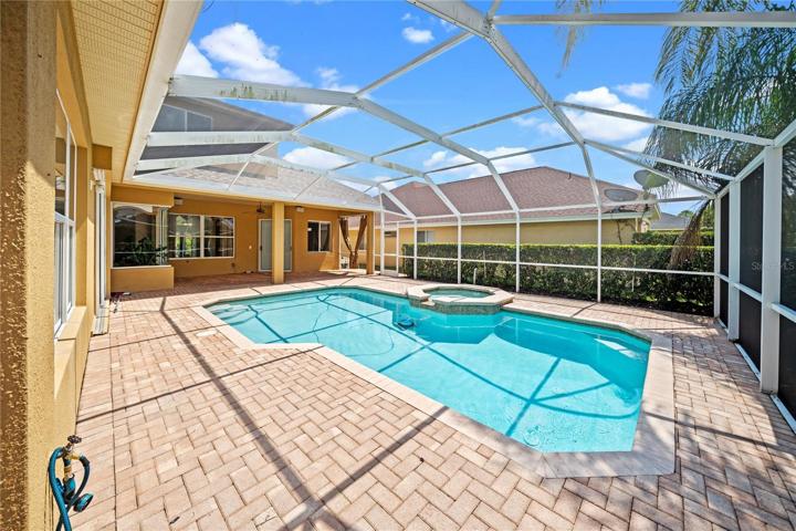 A LARGE SWIMMING POOL WITH SPA