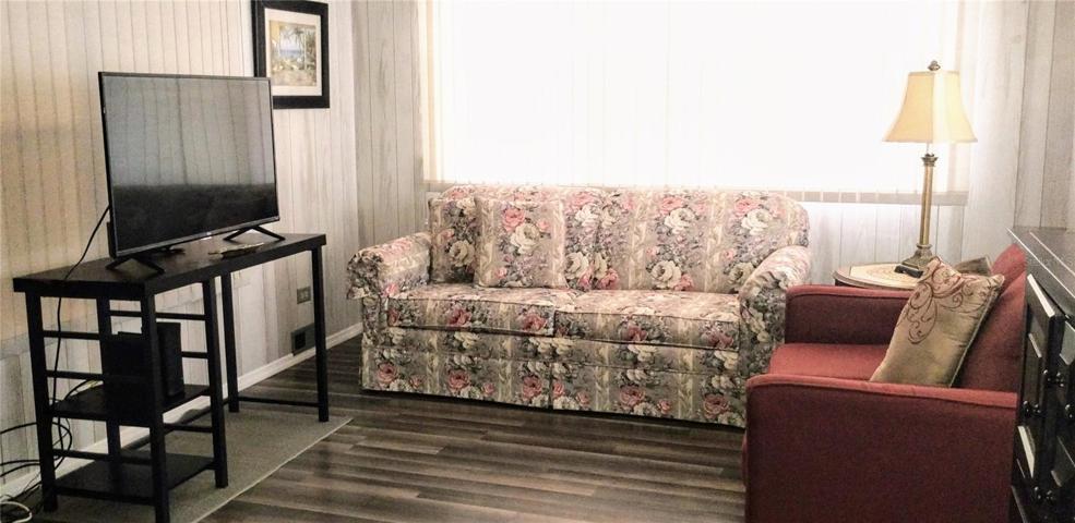 Living Room- All the furniture & smart TV is included.