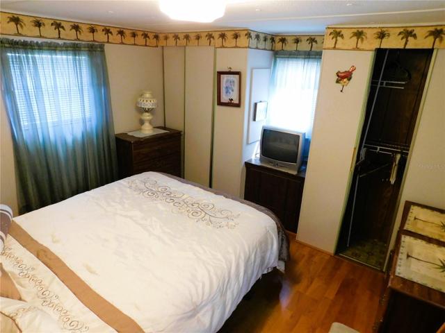 Master bedroom is located in the back of this home.