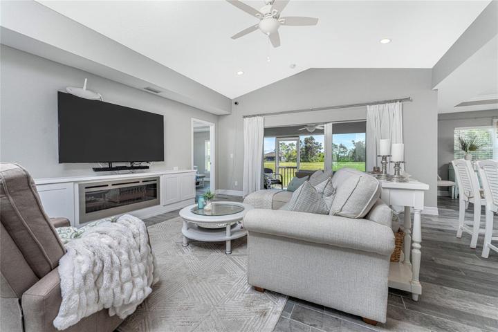 Living area features an electric fireplace, great for some ambiance!