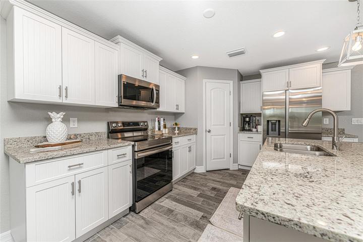Samsung dark stainless appliances are included!