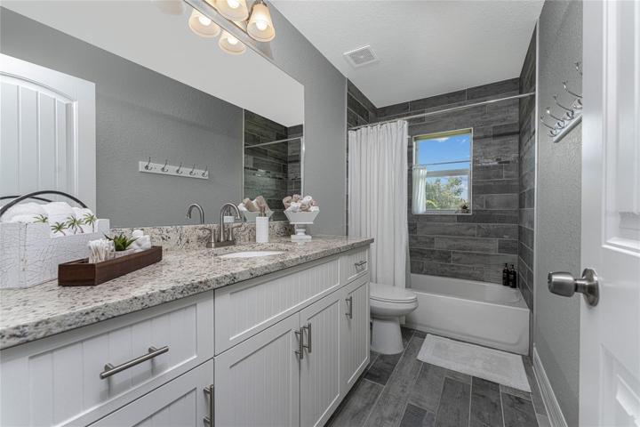 Guest bath #2 offers a combo tub/shower