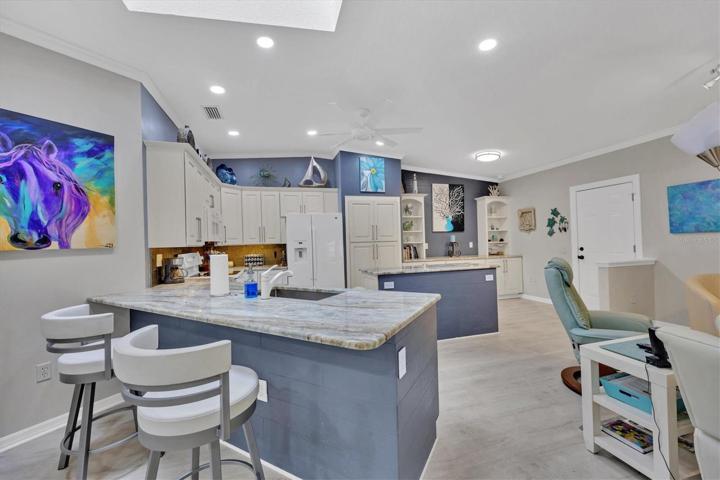 Open kitchen with breakfast bar