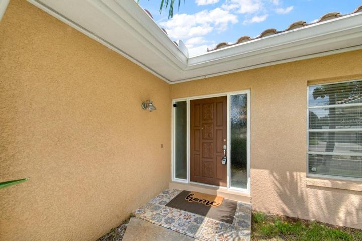 Welcoming entry door w/double sidelights~