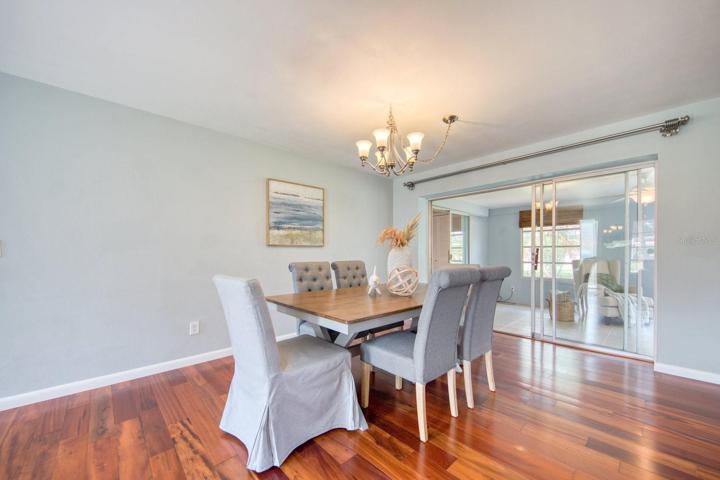 Dining area with sliding doors to bonus room~