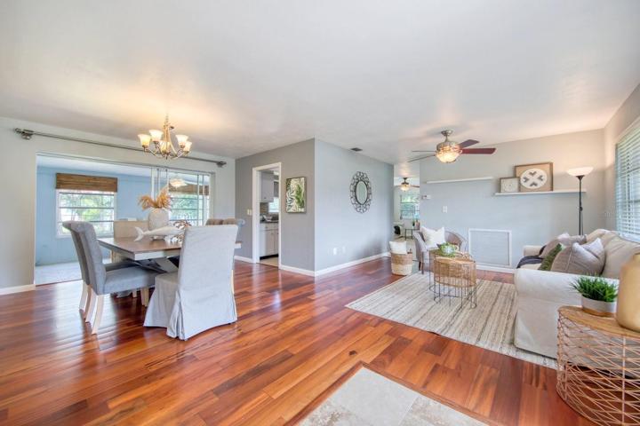 Open living & dining areas with new wood look flooring~