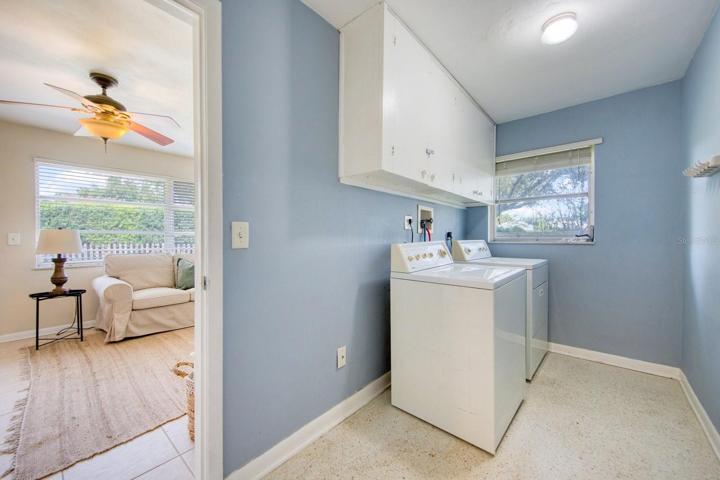 Laundry room with cabinets & room for folding table~