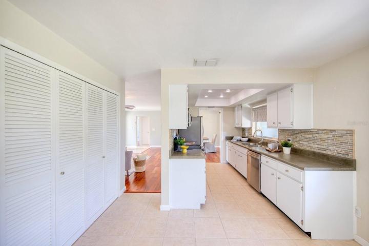 Double pantry closet adjacent to kitchen~