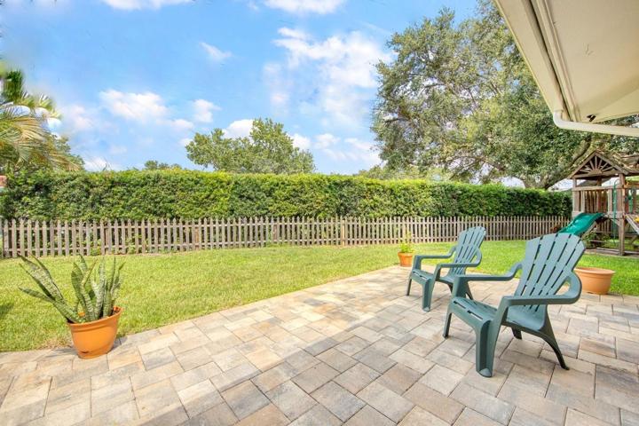 Generous paver patio in back~