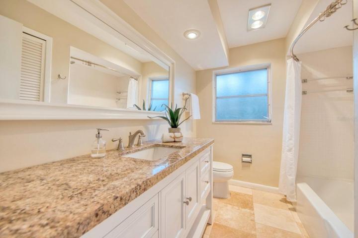 Large updated hall bathroom with tub-shower~