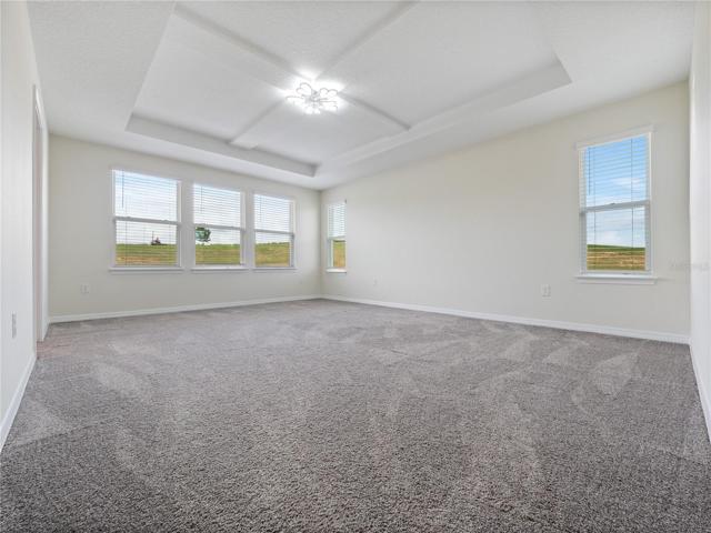 Primary Bedroom with Coffered Ceiling