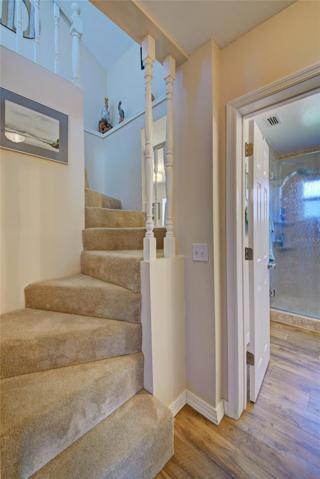 SPIRAL STAIRCASE TO MASTER BED