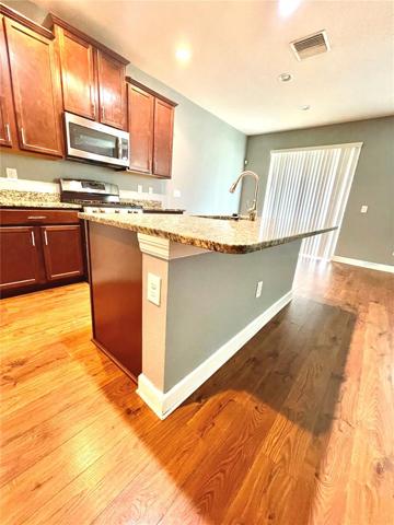 Island Bar, Nook, Sliding Back Door (backyard entrance)