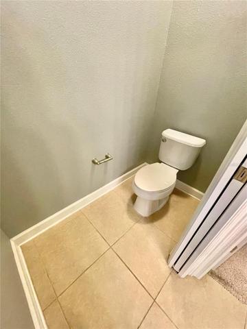 Primary Toilet Room with Sliding Door
