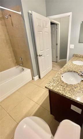 Upstairs Bathroom with Double Vanity, Tub/Shower