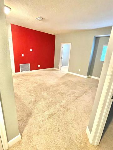 Upper Level Living Room/Bonus Room, Laundry Room