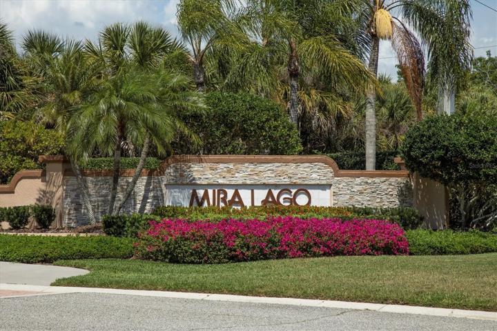 Gated main entrance to Mira Lago
