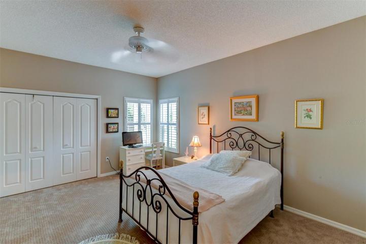 Split floor plan with the guest bedroom is located in the front of the house