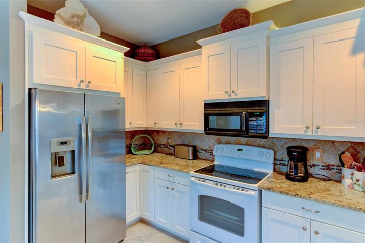 Stainless refrigerator in the kitchen