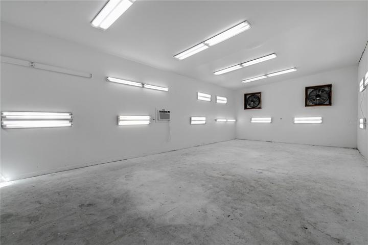 20' X 40' Air conditioned shop with 2 large ventilation fans previously used as a paint room.