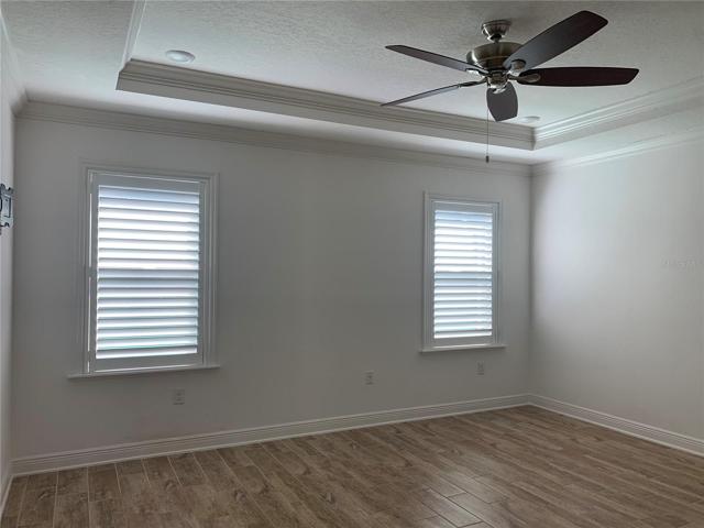 Primary Bedroom With Trey Ceiling