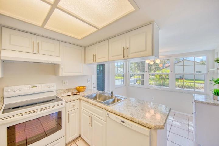 Kitchen dining area & door to garage~
