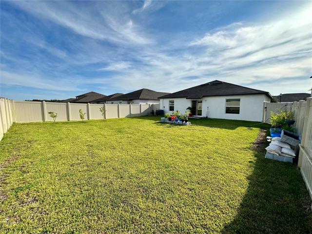 fenced back yard