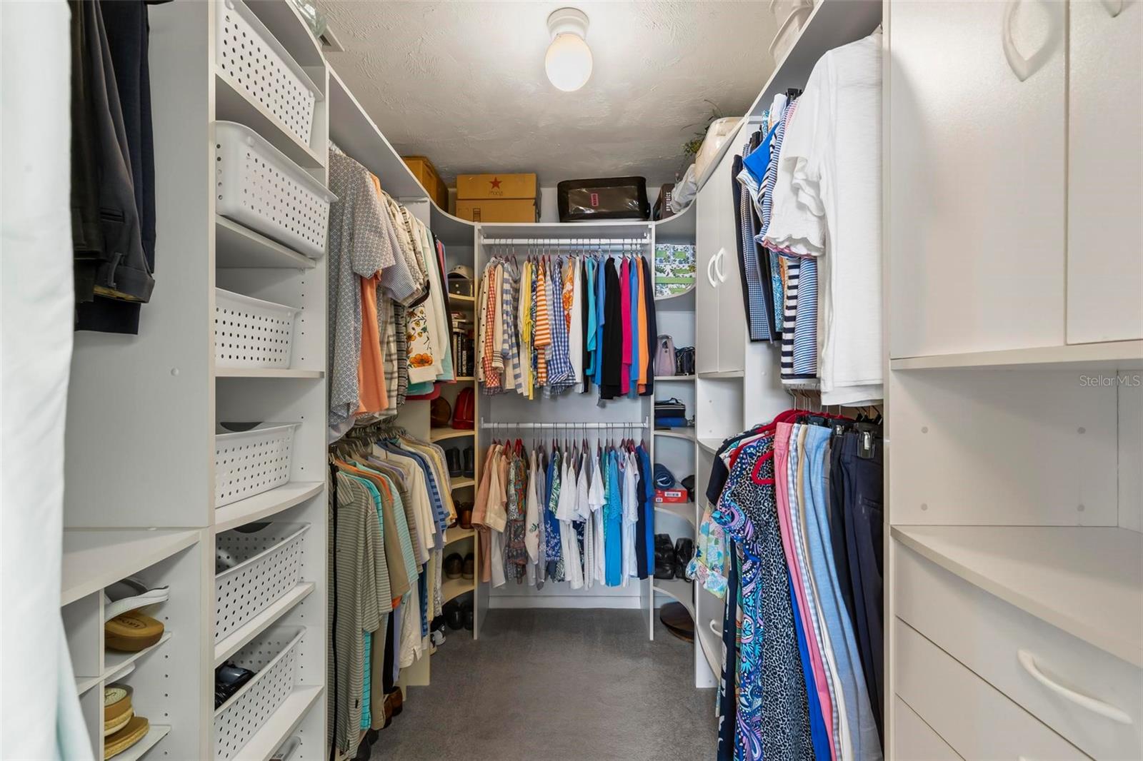 Custom shelving in walk in closet