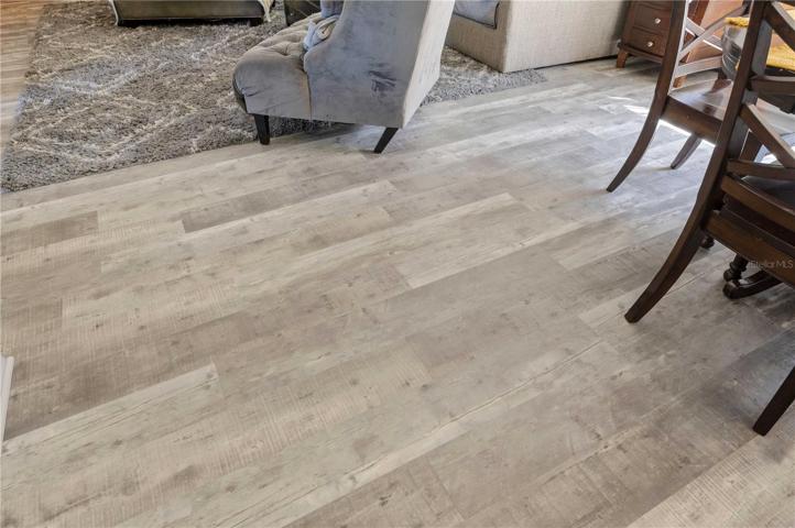 New floors throughout main living area.