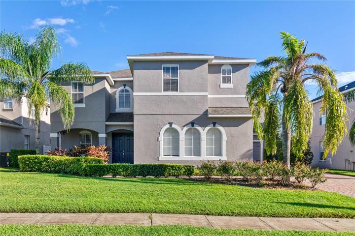 In a great location with access to an array of fantastic amenities this gorgeous 5-Bedroom, 3.5-bath home has all the space you could want and more - there is a flexible office space (5TH BEDROOM!), home gym area and a huge SCREENED LANAI complete with an OUTDOOR KITCHEN!
