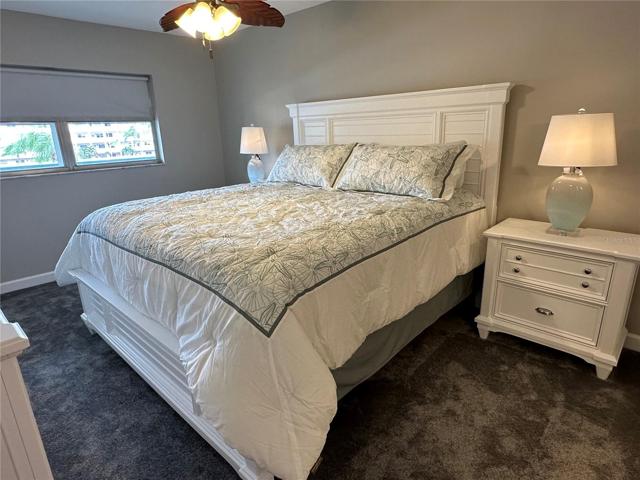 Master Bedroom is light and airy with hurricane shutters open