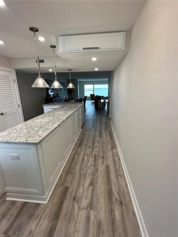 Breathtaking entryway with Cambrian Berwyn Quartz Countertops