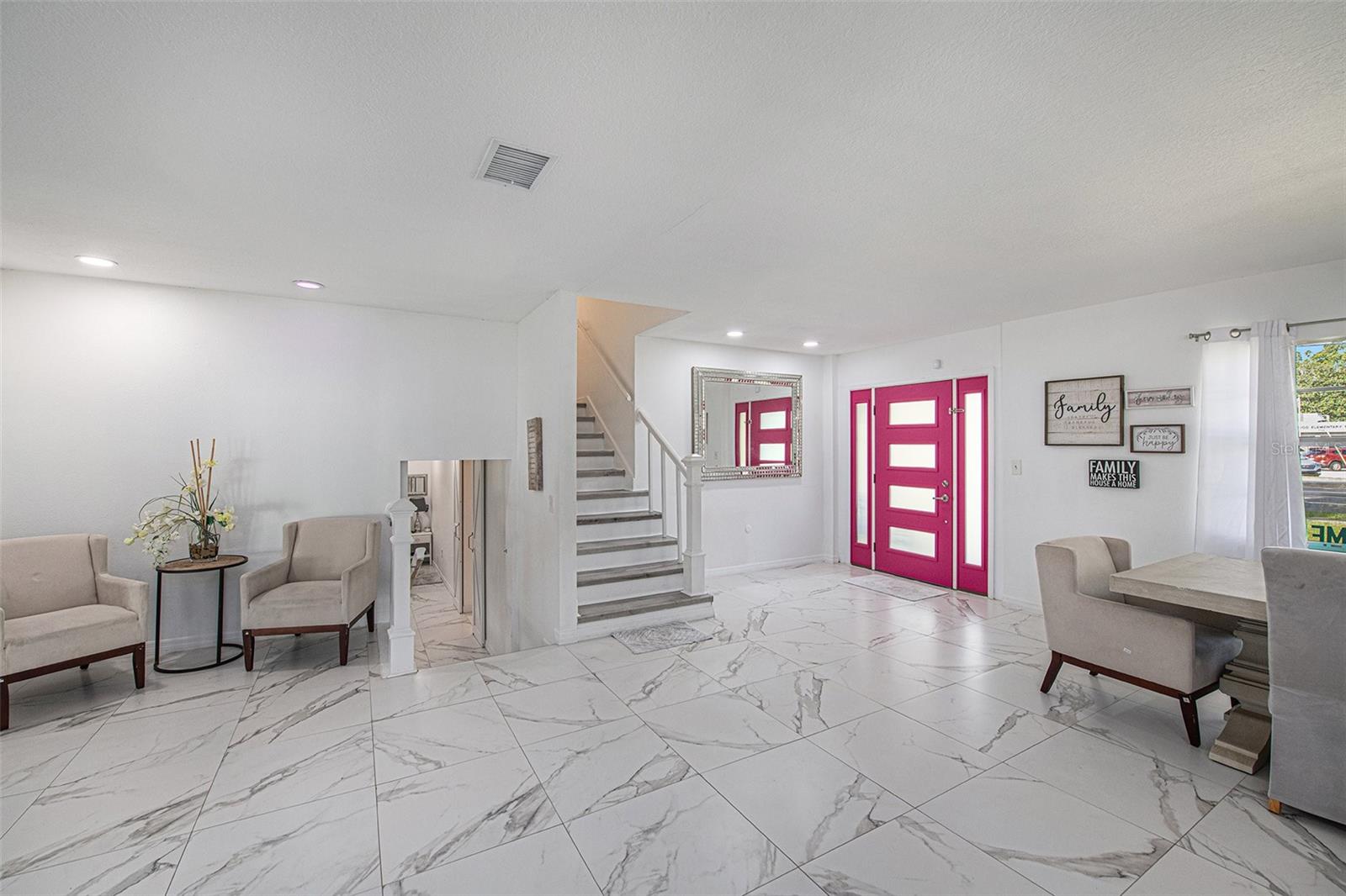 Entrance and View of Stairs to 3rd Floor