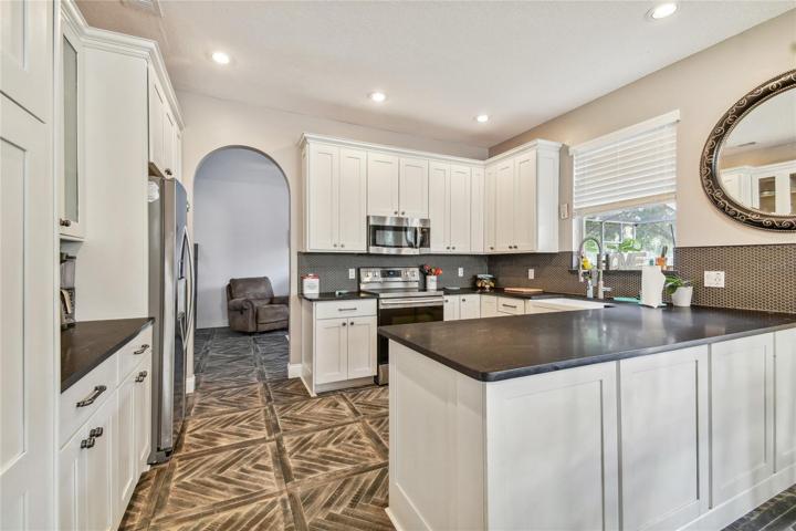 KITCHEN SHOWING ENTRY TO DINING ROOM