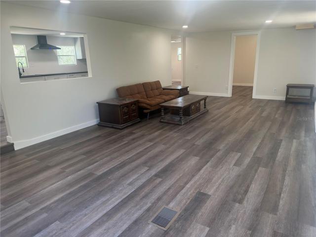 living room with pass thru from kitchen