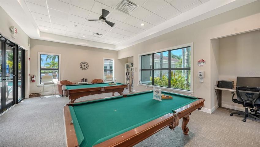 Pool tables and library, office computers in "pool house"... convenient to pool.