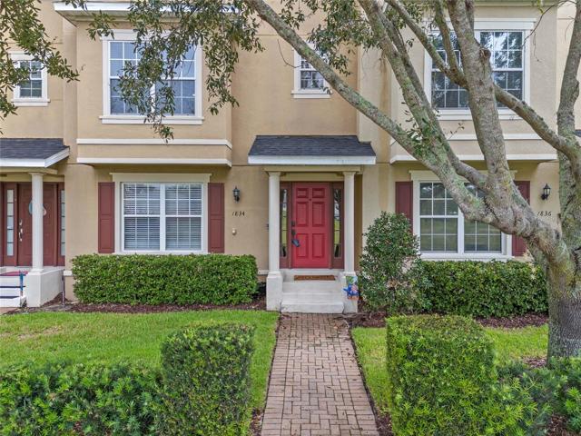 Brick paved walkway and covered front porch