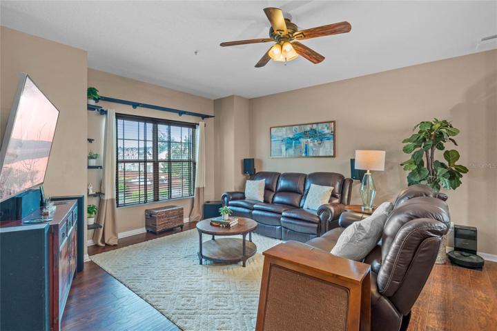 Spacious 2nd floor living room - windows let the natural light in