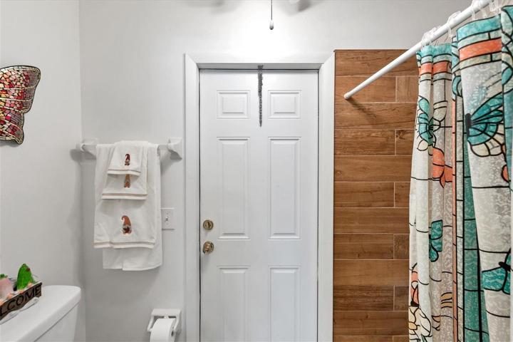 ensuite showing partial view plant tile shower update