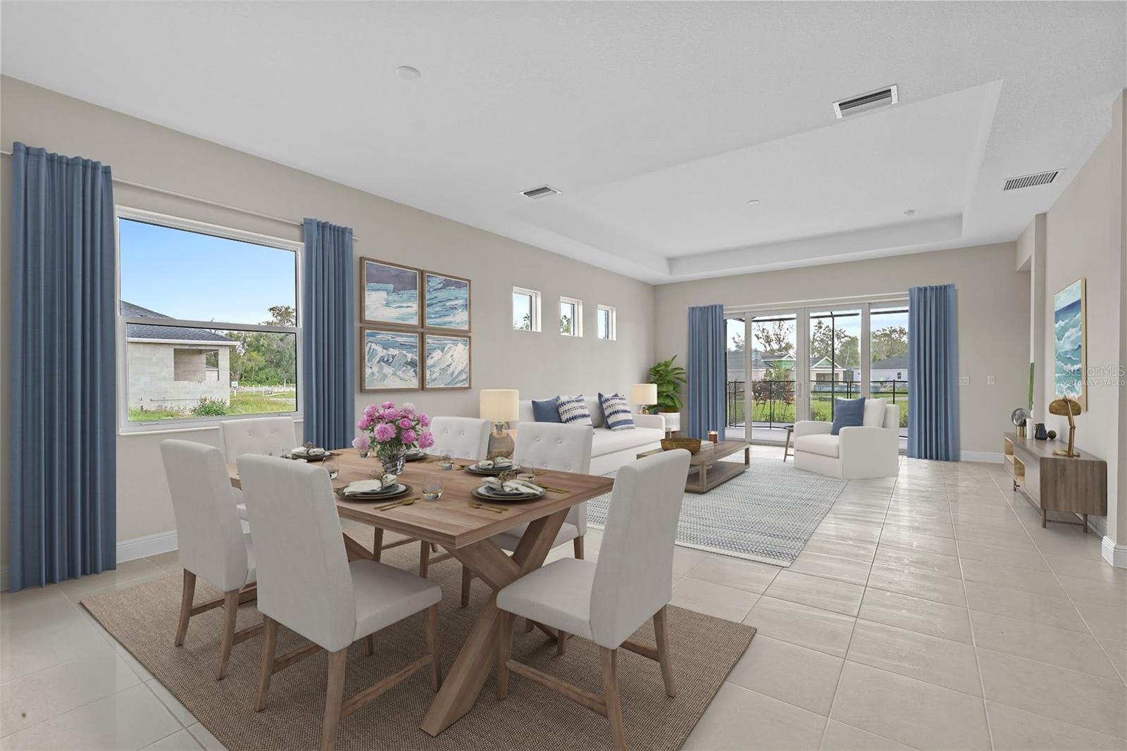 Virtually staged dining room and great room