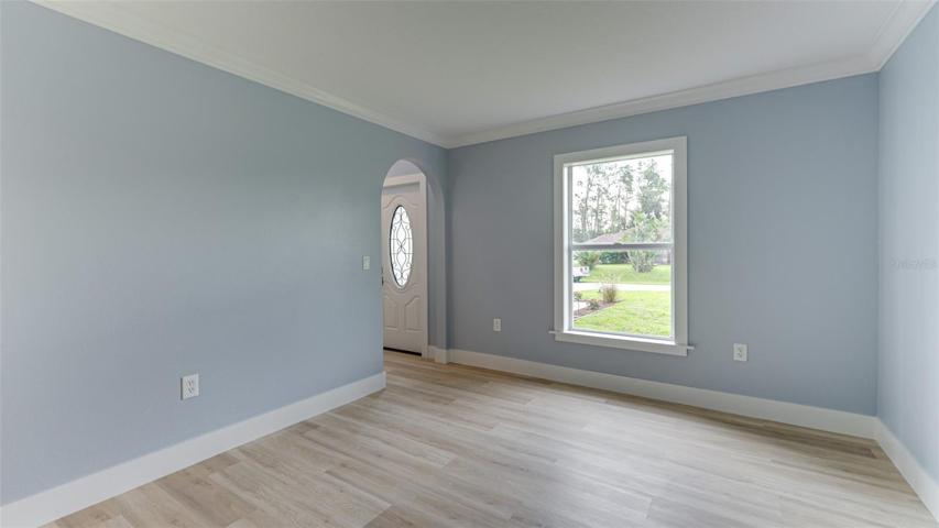 Large bright dining room with nice view of the front yard