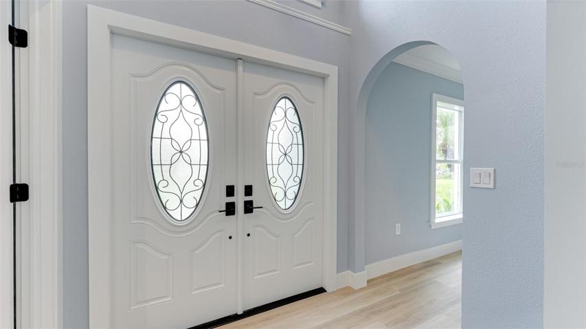 Double door entry to the foyer