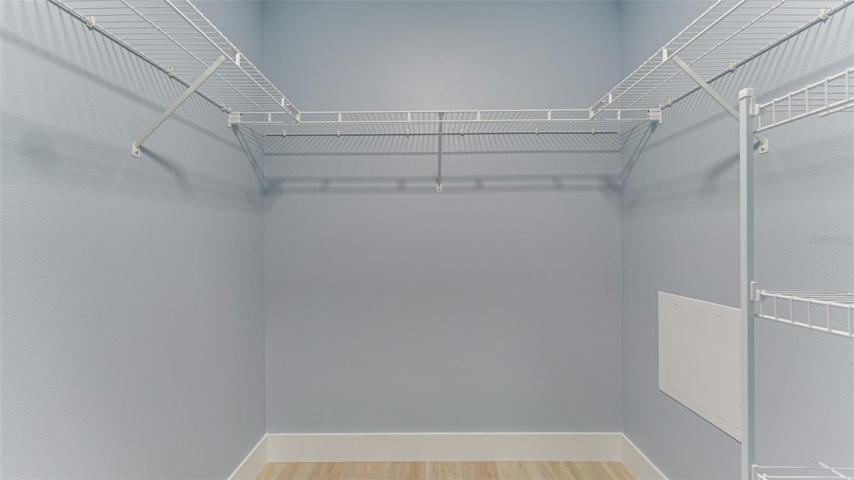 Primary bedroom walk-in closet #1