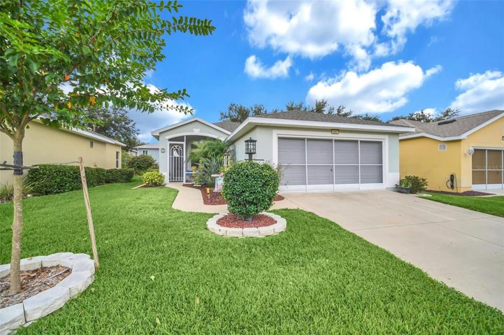 Welcome Home!    5001 Rainbow Trout welcomes you with a nicely landscaped yard.