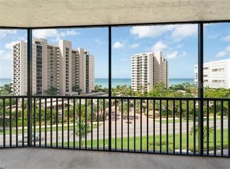 Spacious screened-in patio with water views